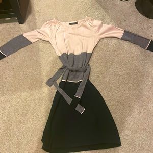 Grey, back, and cream dress